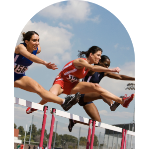 3 females jumping hurdles